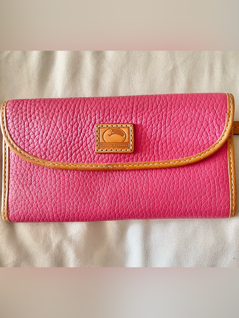 Dooney & Bourke slim leather wallet in raspberry